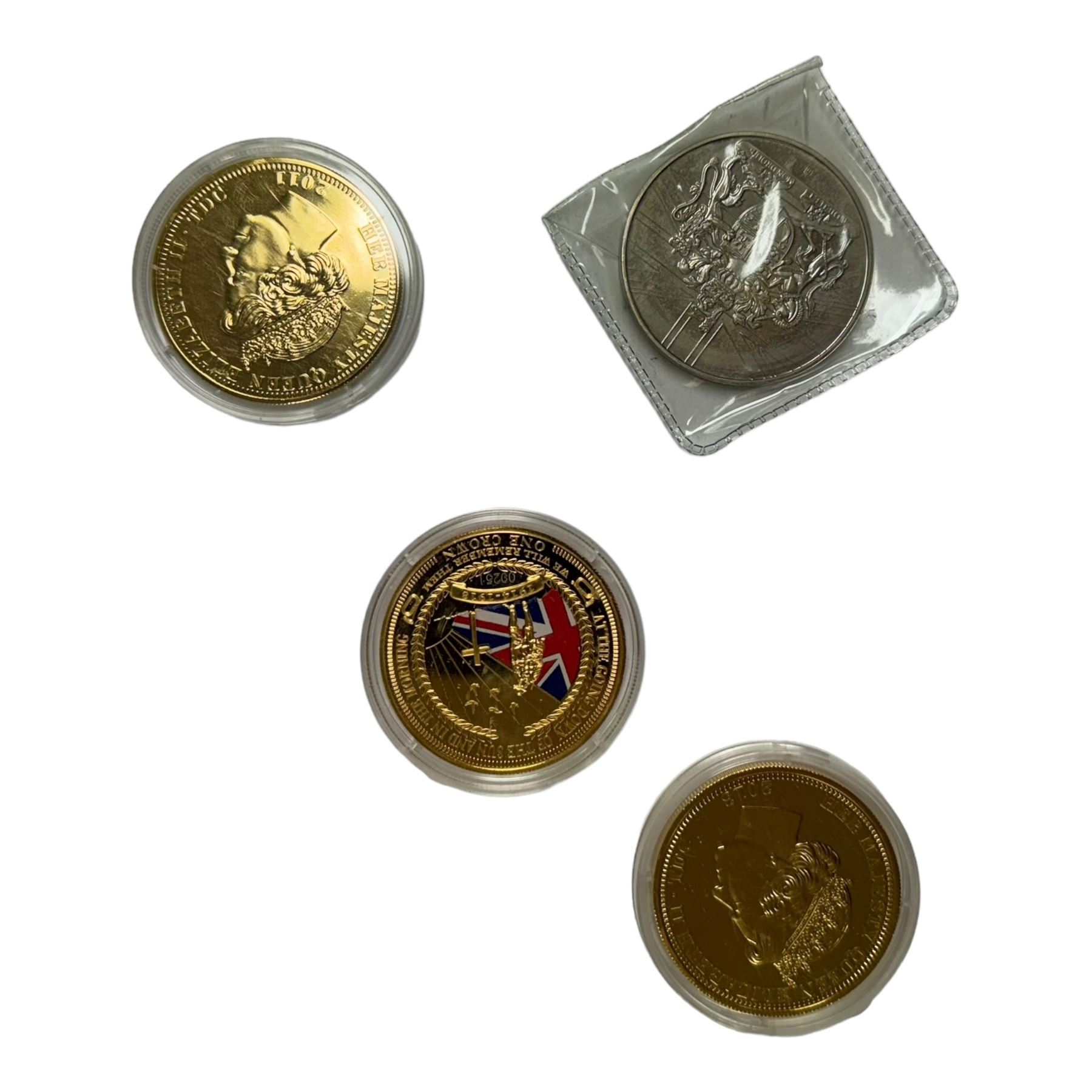 Mostly commemorative coins, medallions and fantasy coinage, including various 'Sainsbury's Makers of the Millennium' medal collection folders containing various medallions, The Toer Mint commemorative four medallion set in fitted case, Queen Elizabeth II 1982 silver proof piedfort twenty pence coin cased with certificate, various part filled The London Mint office folders etc