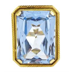 Gold synthetic spinel ring, single octagonal cut synthetic spinel with textured and engraved border