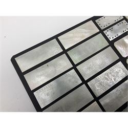 Collection of fifty seven Chinese mother of pearl gaming counters or tokens, of various size and form including rectangular, circular and fish shaped examples, various decoration including floral motifs, largest rectangular examples L6cm
