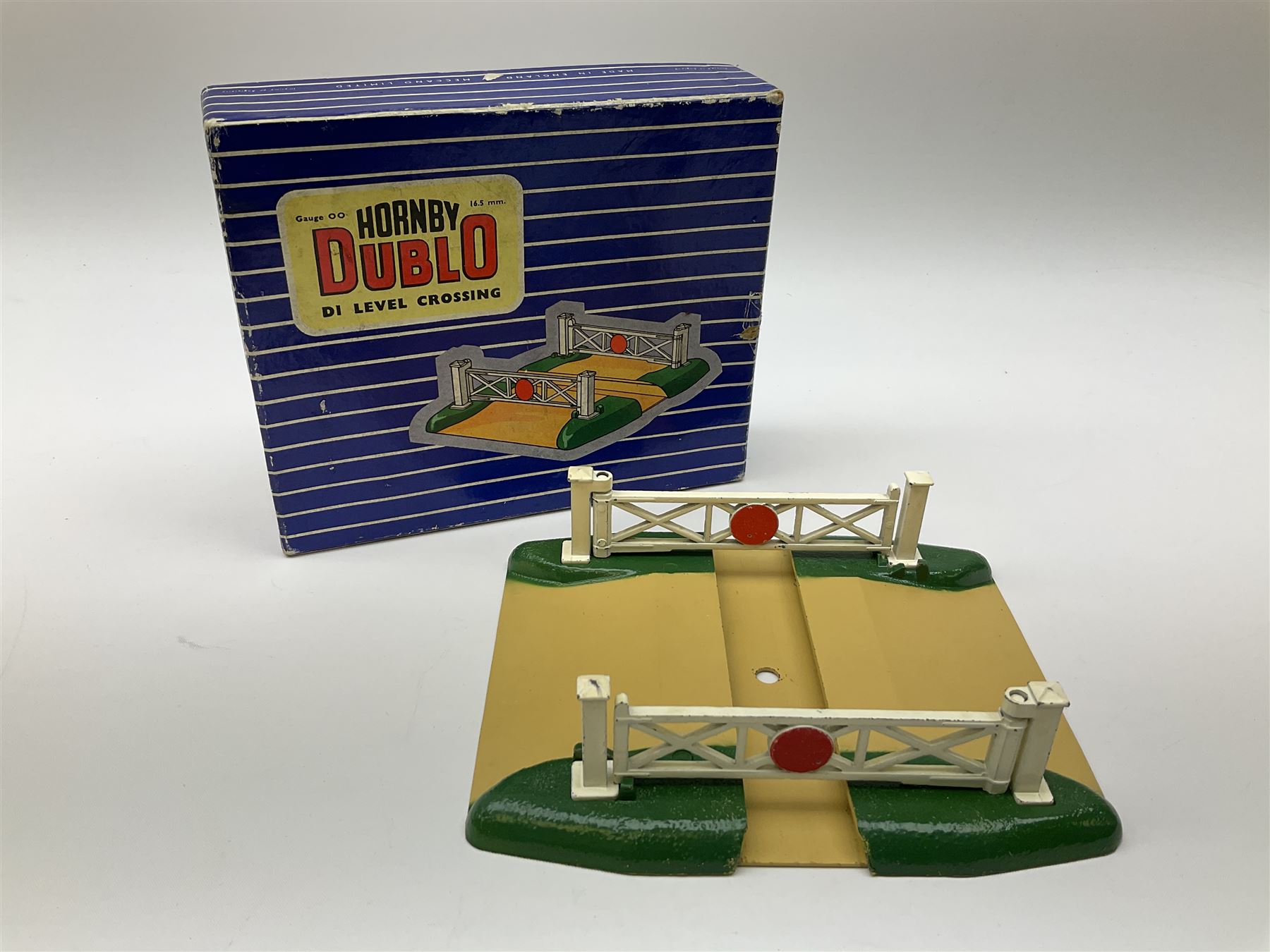 Hornby Dublo - six D1 accessories comprising Turntable; Through Station with separately boxed Platform Extension with Wall; Signal Cabin with orange roof and two packs of station names; Level Crossing; and Island Platform; all boxed (6)