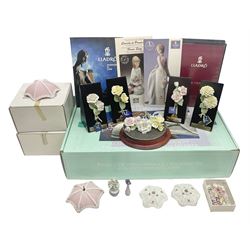 Seven Lladro flowers, comprising Japanese Camelia on base no 5181, Yellow Begonia on base no 5186, Miniature Begonia on base no 5188, Chrysanthemum on base no 5189, California Poppy no 5190.B, Miniature Begonia 5188.B and White Carnation no 5184.B, together with Lladro Spanish Joining pack with 17616 Winter Bell, Additional Lladro parasols and flowers etc 