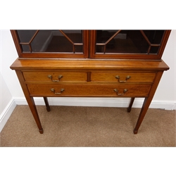  Early 20th century Georgian style mahogany bookcase on stand, broken arched pediment with dentil detail and scrolled inlays, two astragal glazed doors enclosing adjustable shelves, stand with two short and one long drawer, square tapering supports with spade feet, W108cm, H211cm, D39cm  