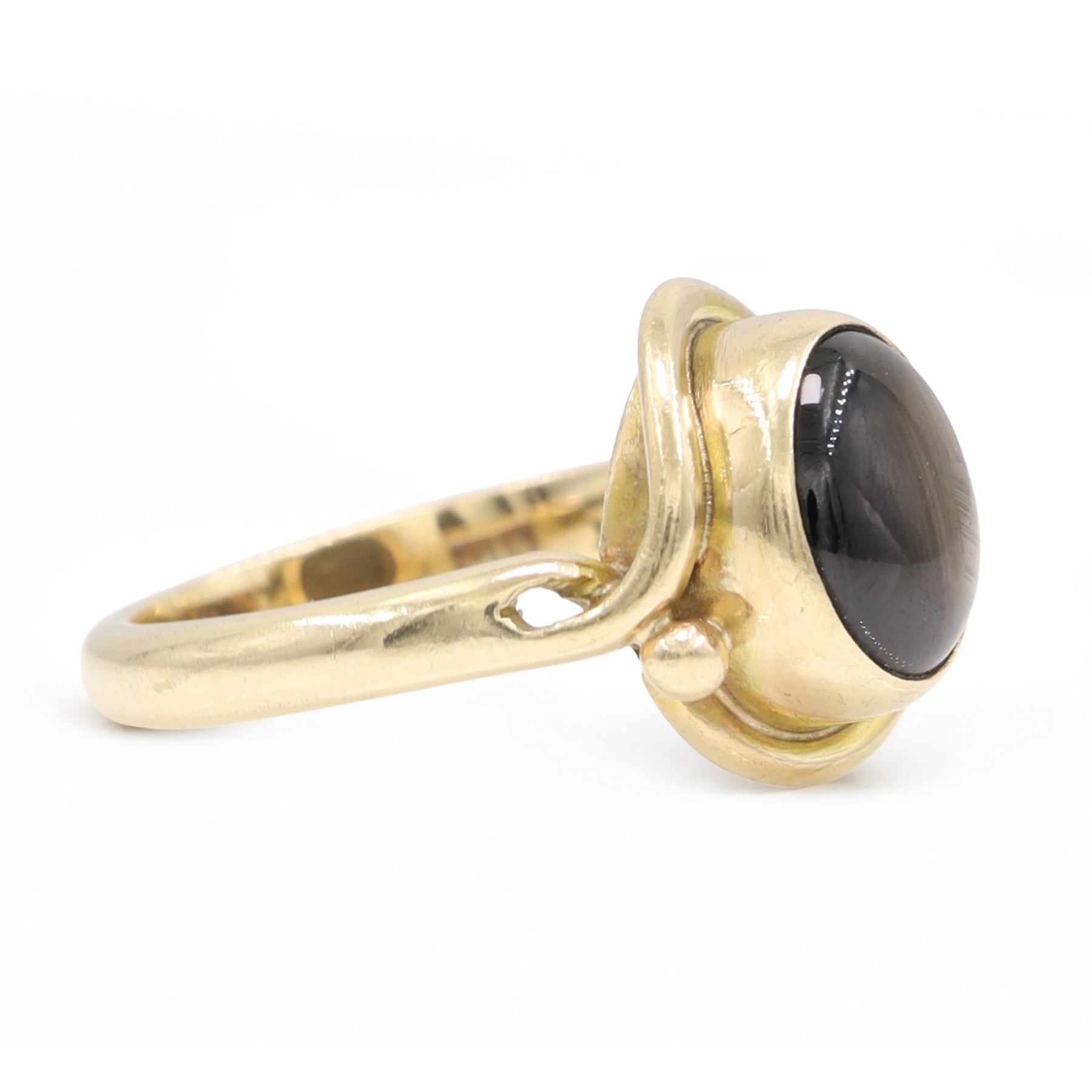 9ct gold black sapphire ring, bezel set with a single cabochon cut sapphire, London 1996