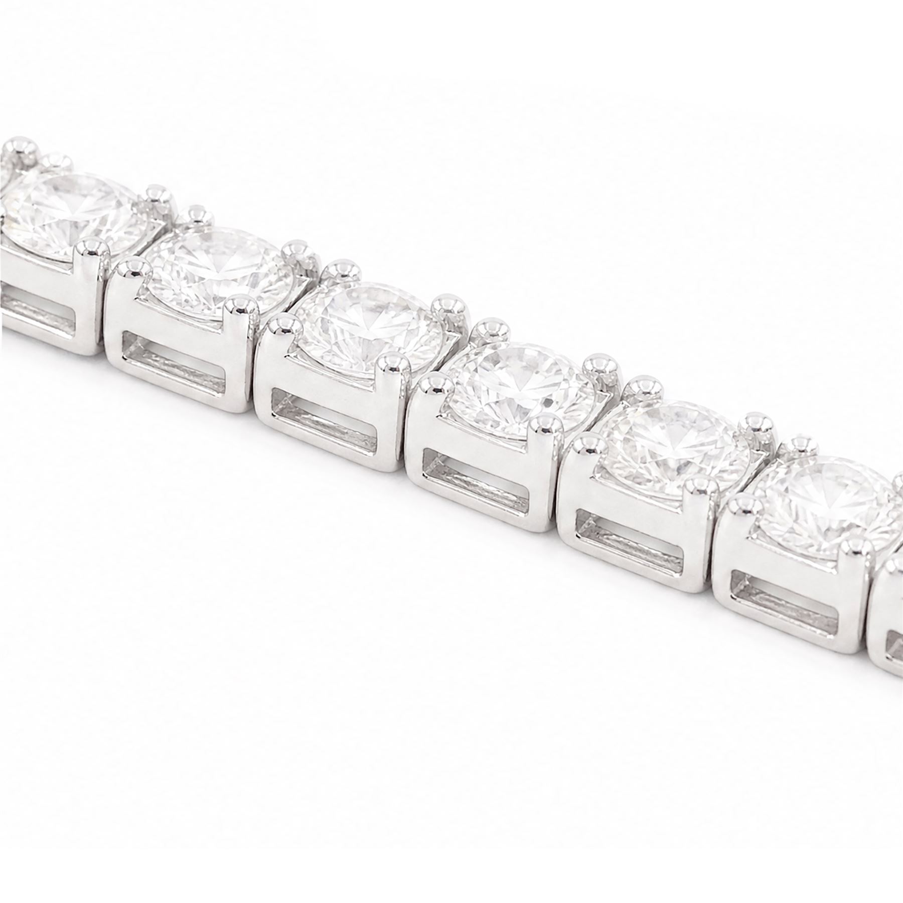 18ct white gold diamond bracelet, four claw set with seventy-three round brilliant cut diamonds, stamped, total diamond weight approx 2.50 carat