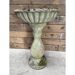 Cast stone classical design birdbath,  fluted edges on pedestal base