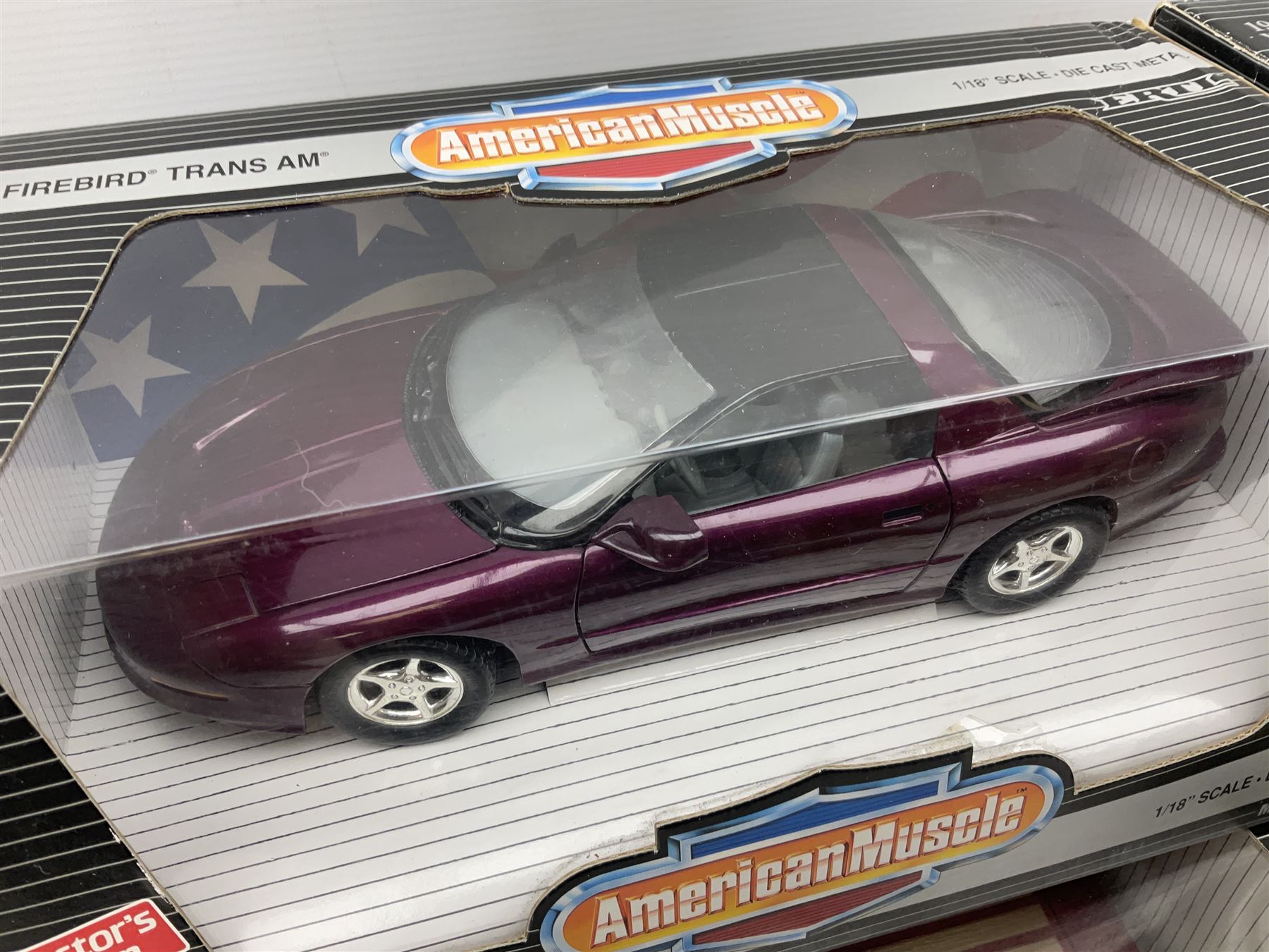 Ertl - three American Muscle 1:18 scale die-cast models comprising 1995 Dodge Ram 2500 SLT; '78 Dodge Lil Red Truck; and 1996 Firebird Trans Am; together with an Ertl European Classics 1:18 scale 1948 Jaguar XK120; all boxed (4)