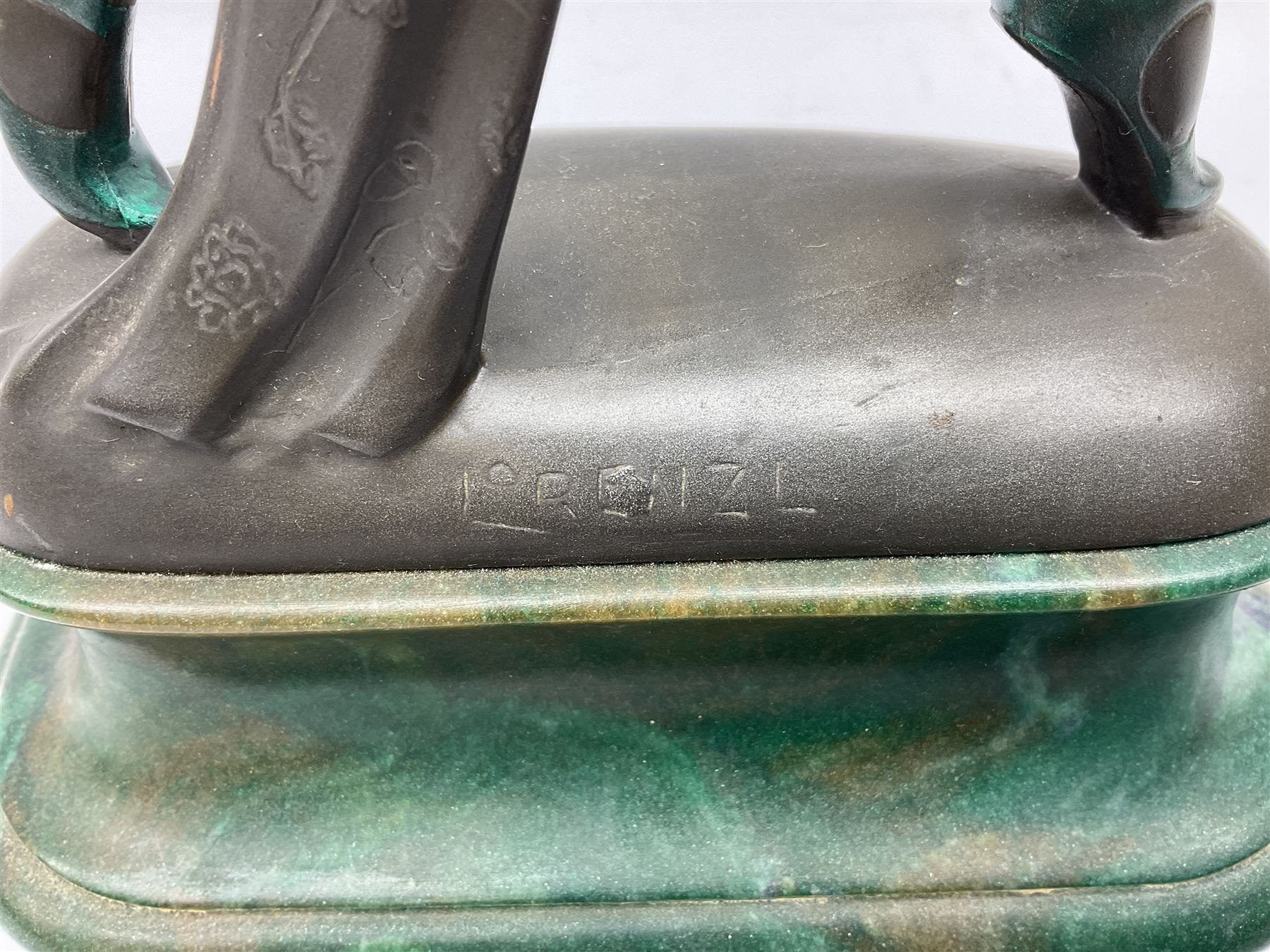 Art Deco style bronze, after Josef Lorenzl, modelled as a dancing lady with outstretched arms, with resin head and hands, raised upon marble effect base, signed to base, H38cm