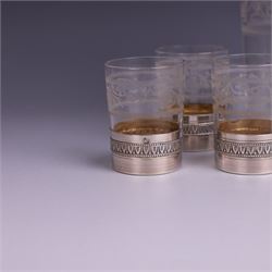 French silver mounted glass decanter and shot glass set, the decanter with silver covered stopper, removable silver collar, and etched decoration to glass body, the six silver mounted glasses each with etched decoration, silver stamped with Minerva's head, decanter H 21cm
