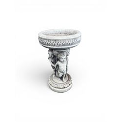 Cast stone cherub bird bath, circular removable top raised on three cherubs with ornate detailing