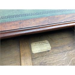 George III mahogany twin pedestal partners desk, rectangular top with moulded edge and an inset green tooled leather writing surface with Greek key design border, fitted with three cock-beaded frieze drawers to each side, each pedestal with three graduating drawers with an opposing panelled cupboard enclosing a single shelf, the facias fitted with brass lion mask plates with ring handles, the lower moulded edge over a plinth base and castors, London furniture dealers label to interior of drawer inscribed 'J. Webb, Office Furniture 323, Gray's Inn Road, King's Cross'  H75cm  W153cm  D97cm