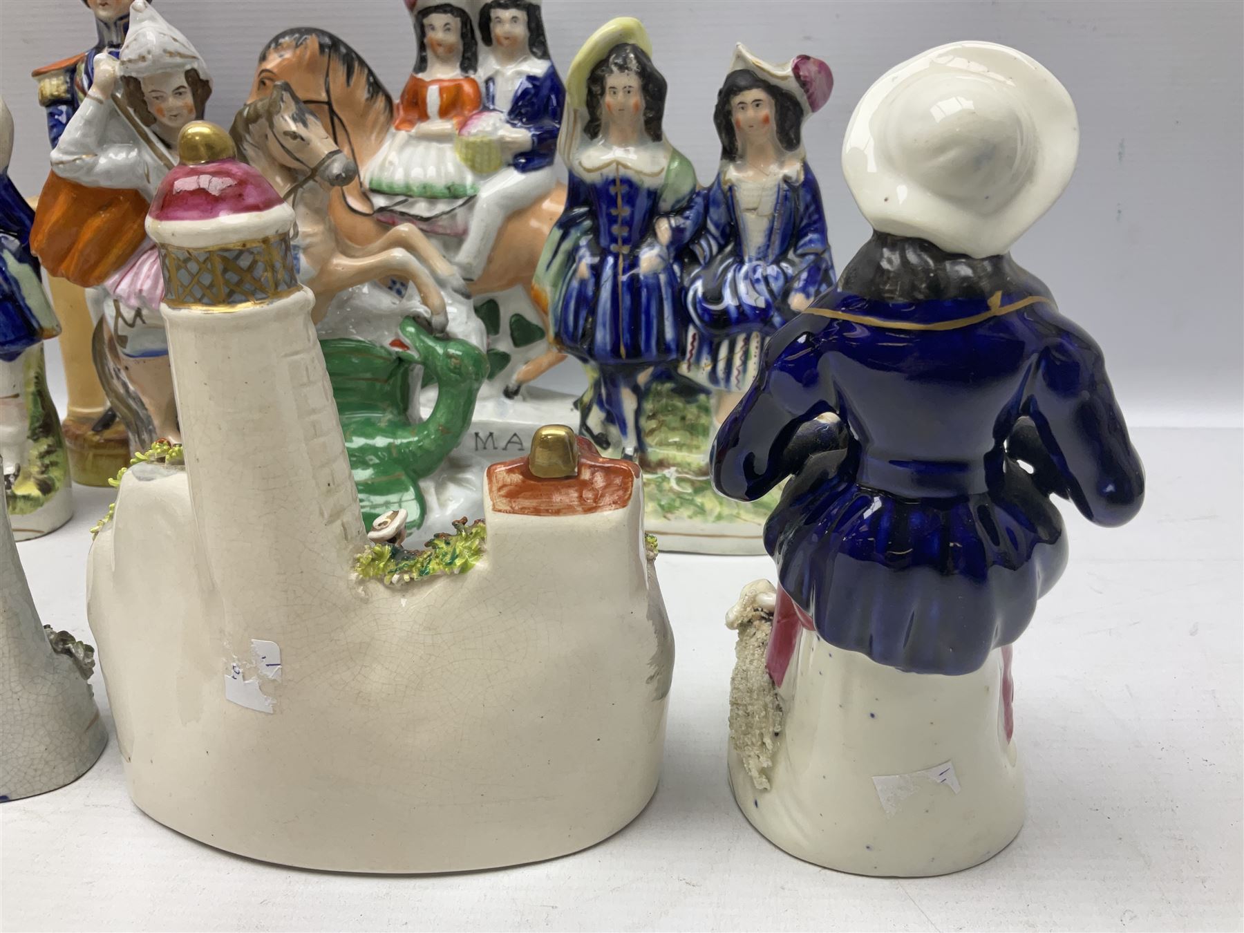 Quantity of Victorian and later Staffordshire style figures, to include examples upon horseback, sheep, drummer etc