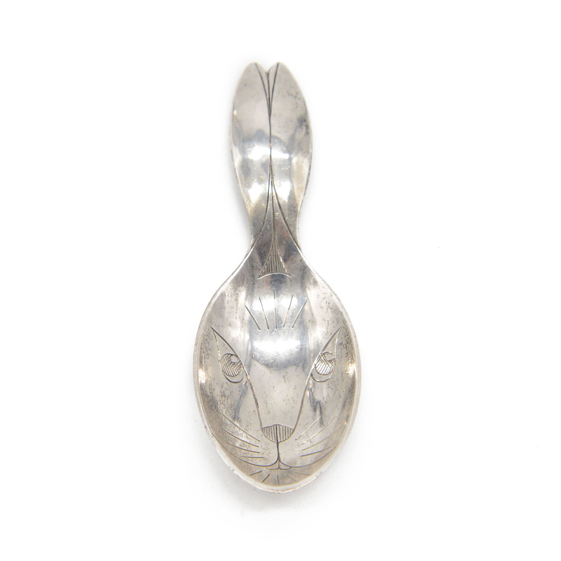 Arts and Crafts silver rabbit caddy spoon, the face engraved to the hammered oval bowl, with the handle formed as the rabbit's ears, hallmarked Henry George Murphy, London 1934, with Murphy's Falcon stamp, L10cm