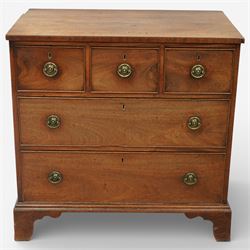 Small 19th century mahogany chest of drawers, rectangular top with moulded edge over three short and two long drawers, the drawers fitted with brass ring handles and key escutcheons, raised on shaped bracket feet