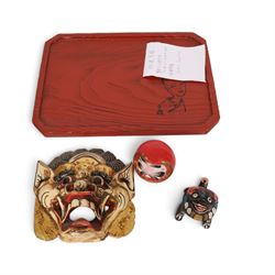 Wooden Balinese Barong mask, together with Sugiura Yukio Japanese tray, Daruma doll and one other 