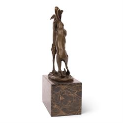 After Mario Nick - two hares boxing, bronze figure group, signed Nick and bearing foundry mark, upon rectangular plinth, H24cm
