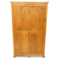 Beaverman - Yorkshire oak panelled double wardrobe, with carved pediment, panelled doors and sides, with internal top shelf above a single hanging rail, with carved beaver signature, by Colin Almack of Sutton near Thirsk
