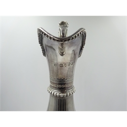 Victorian silver claret jug, ovoid form body chased with floral garlands, oval cartouches above a band of trailing vine leaves, acanthus and beaded scroll handle and chased tapered neck & foot, by Thomas Smily London 1875, approx 25oz, H35cm   