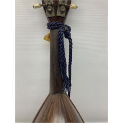 Late 19th/early 20th century Italian lute back mandolin with segmented back and spruce top; bears maker's label for Pietro Tonelli Napoli; together with a mandolin instruction booklet and a folding music stand L60.5cm