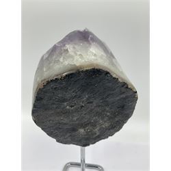 Amethyst crystal geode cluster, with large well-defined crystals, upon a metal stand, H21cm