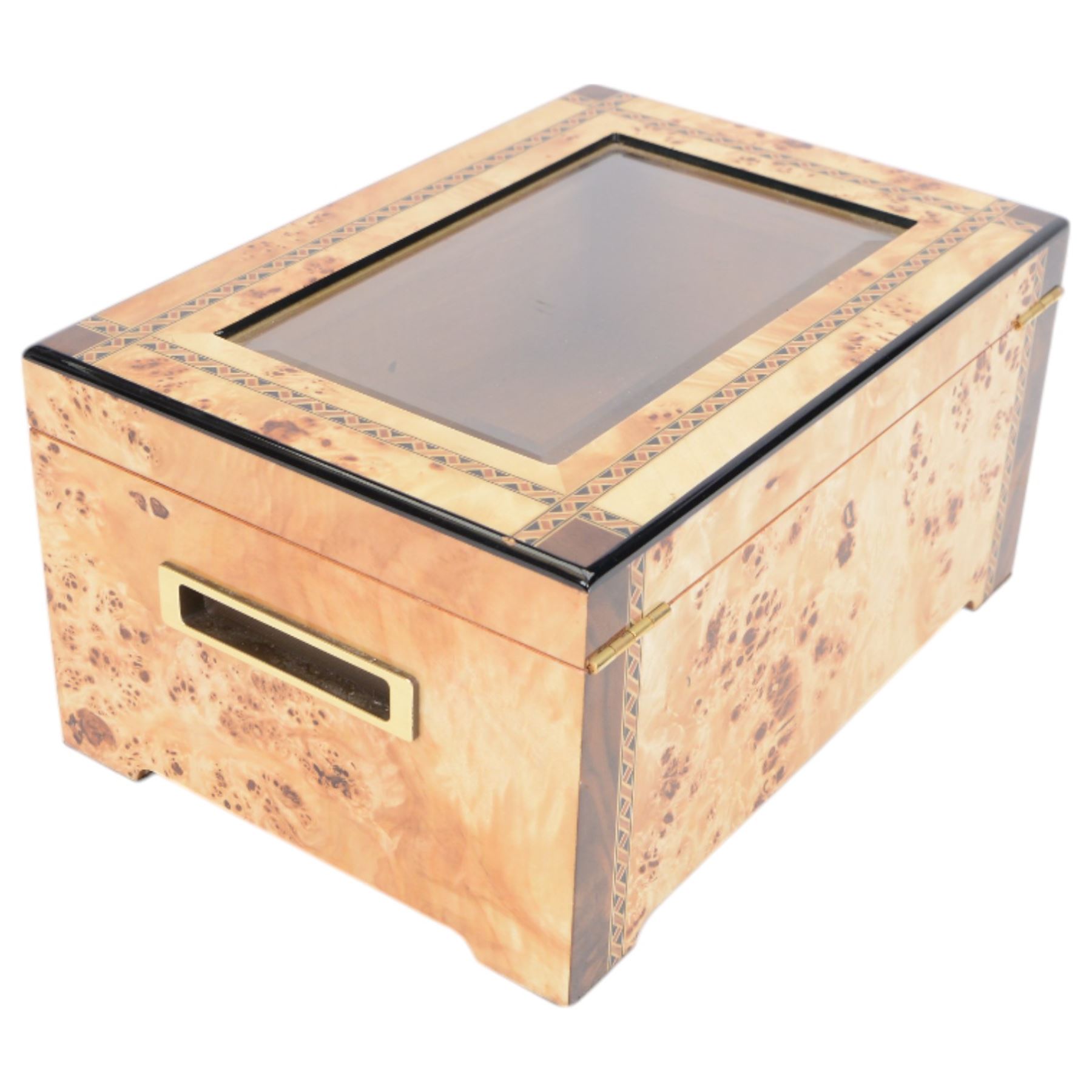 Cigar humidor, of high gloss birdseye maple veneer, the lid with central glass panel, brass handled draw to the front, fitted with a hygrometer, H18cm D24cm 
