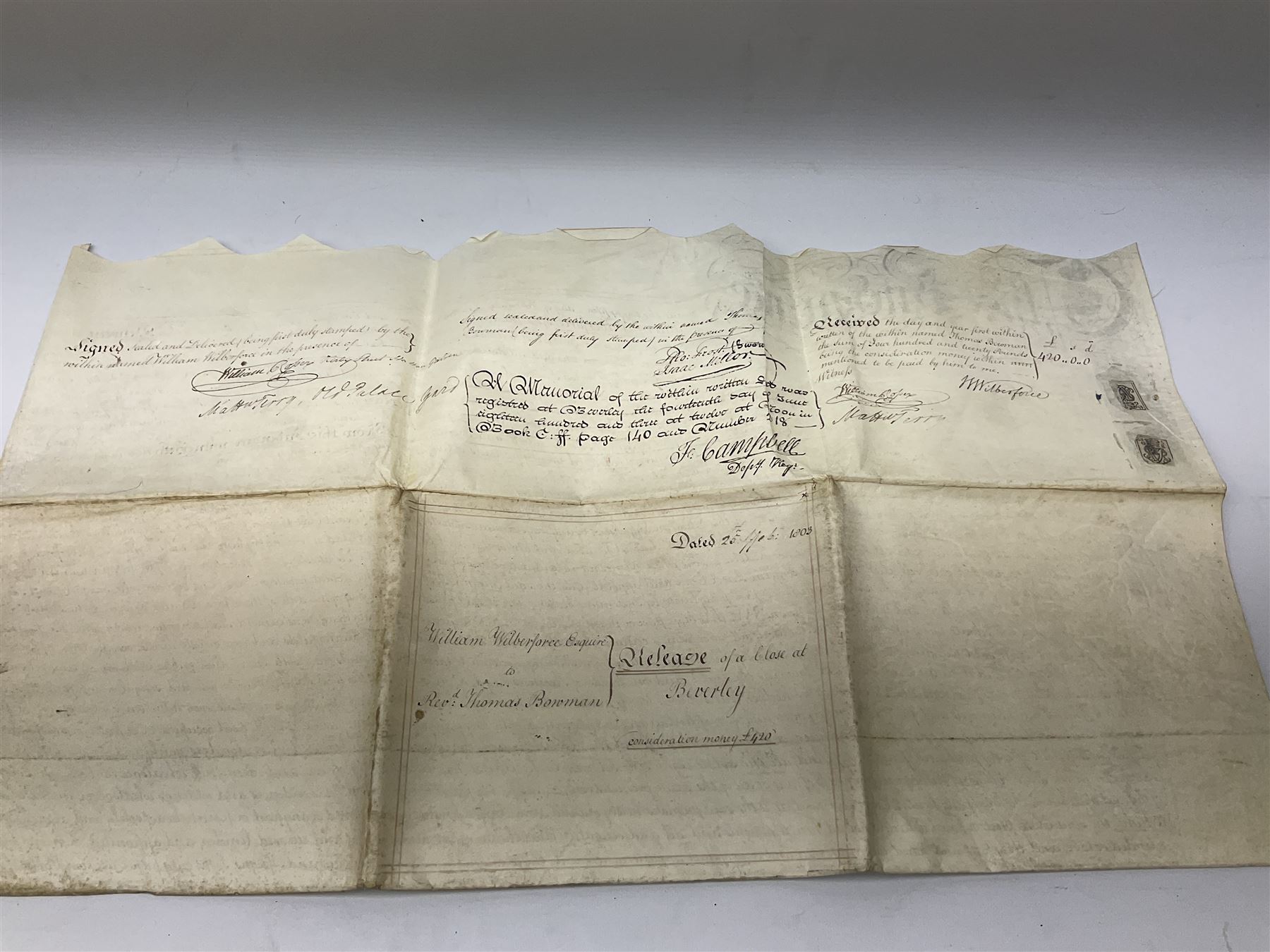 Early 19th century manuscript deed on vellum in three sections dated 25th February 1803 relating to 'An agreement between William Wilberforce, of the old palace yard, Westminster - son of Robert, AND The Reverend Thomas Bowman, of Beverley, who has agreed to buy from William Wilberforce the Freehold of a 