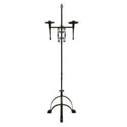 Ironwork candle holder stand, with stamped decoration, adjustable two branch sconces with scrolled iron work, twist stem with arched supports with scrolled terminals