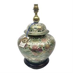 Table lamp of squat baluster form, decorated with Mandarin ducks and floral  landscape, upon a circular wooden base H42cm