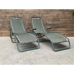 Pair metal framed folding sun loungers