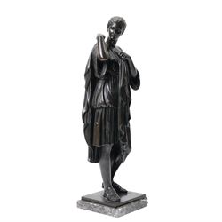 After the Antique - Grand Tour patinated bronze figure of a Vestal Virgin, the maiden standing in contrapposto, draped in classical robes and pinning her chiton at the shoulder and chest, on a square marble base stamped to rear, circa 1900, W15cm H47cm
