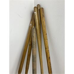 Quantity of croquet equipment, comprising four George G. Bussey mallets, two further smaller mallets, set of six metal hoops and centre post