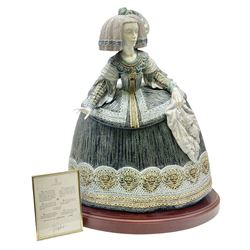 Large Lladro figure, La Menina, modelled as a maid of honor in service, on a mahogany oval base, limited edition 99/1000, sculpted by Jose Puche, with certificate of authenticity, framed and glazed, no 1812, year issued 1996, year retired 2019, H60cm