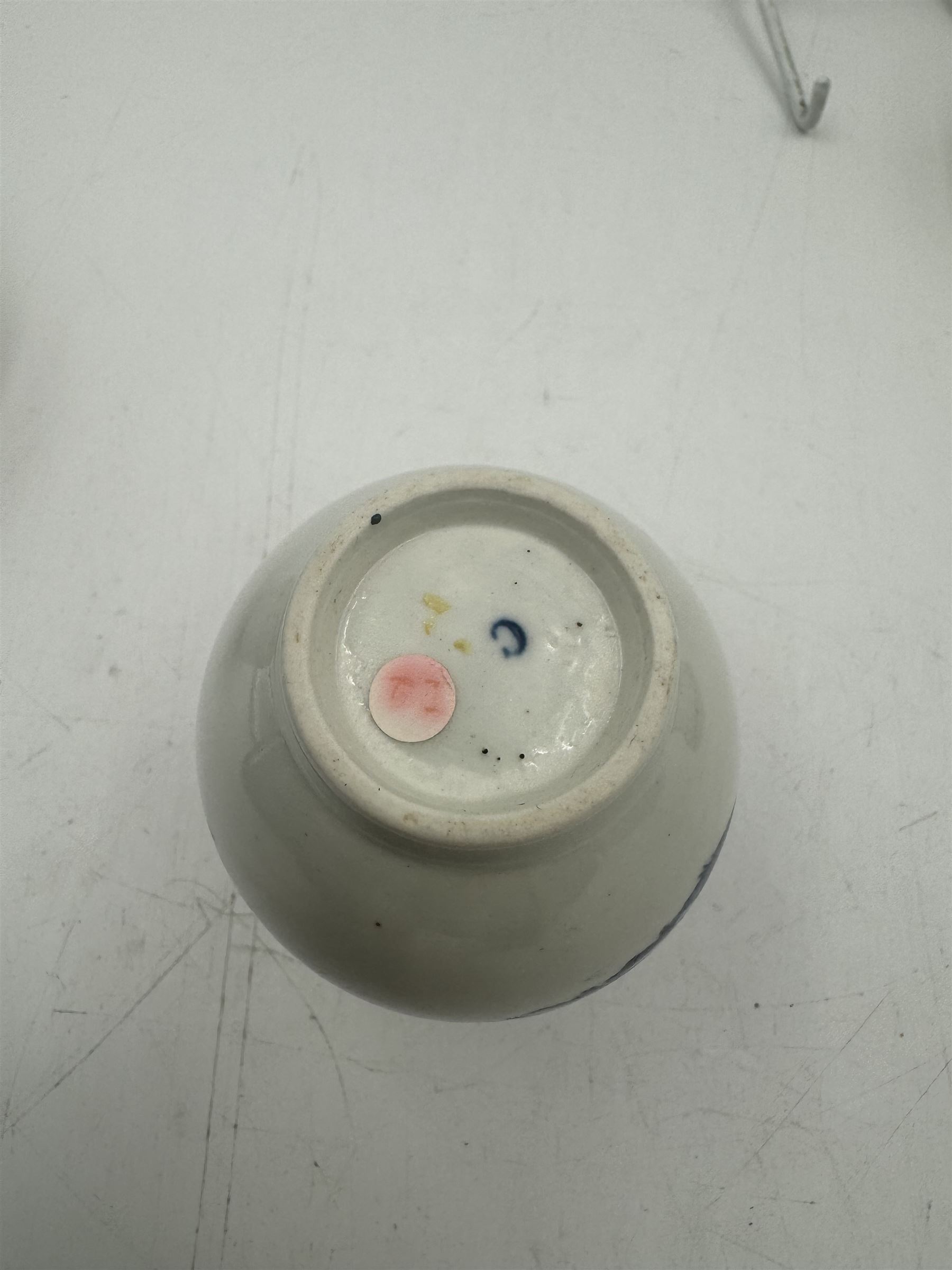 18th century Caughley blue and white sparrow jug, decorated in the Mother and Child pattern, circa 1780-1790, with underglaze C mark beneath, H9cm, together with a Worcester coffee cup, circa 1785 painted with floral sprays in underglaze blue and gilt, with crescent mark beneath, and a Caughley trio of tea cup, tea bowl and saucer, each of moulded wrythen fluted form and decorated with gilt and blue sprigs and bands, each with crescent mark beneath, (5)