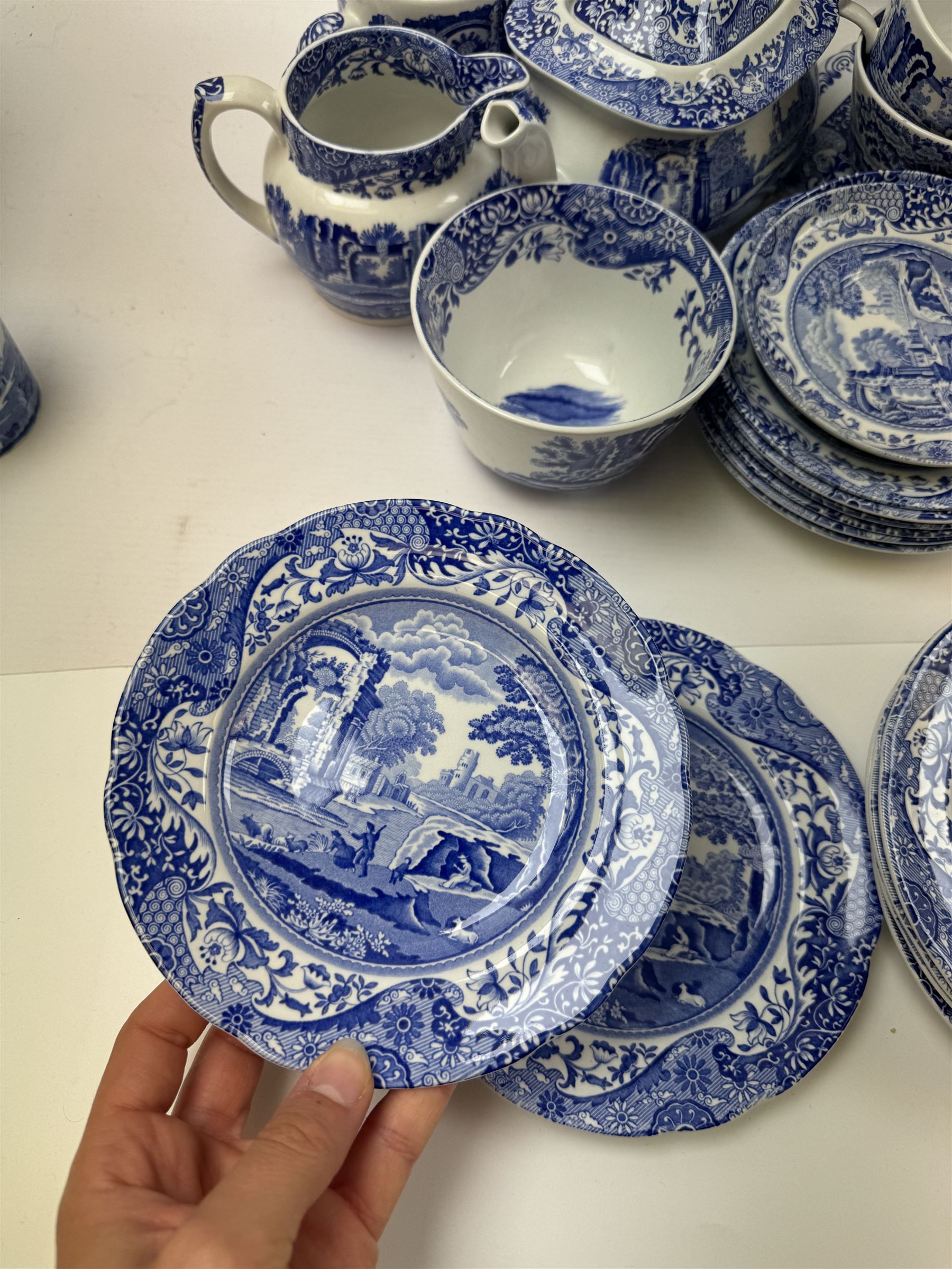 Spode Italian pattern tea service, comprising teapot, milk jug, open sucrier, six cups and saucers, two coffee cans and saucers, six dessert plates, four mugs and a sandwich plate (30) 