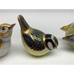 Three Royal Crown Derby paperweights, comprising Blue tit, Nightingale and Greenfinch, all with gold stoppers and printed marks beneath, largest H9cm