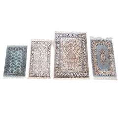 Small Bokhara green rug, Chinese hearth rug and two modern Persian design rugs