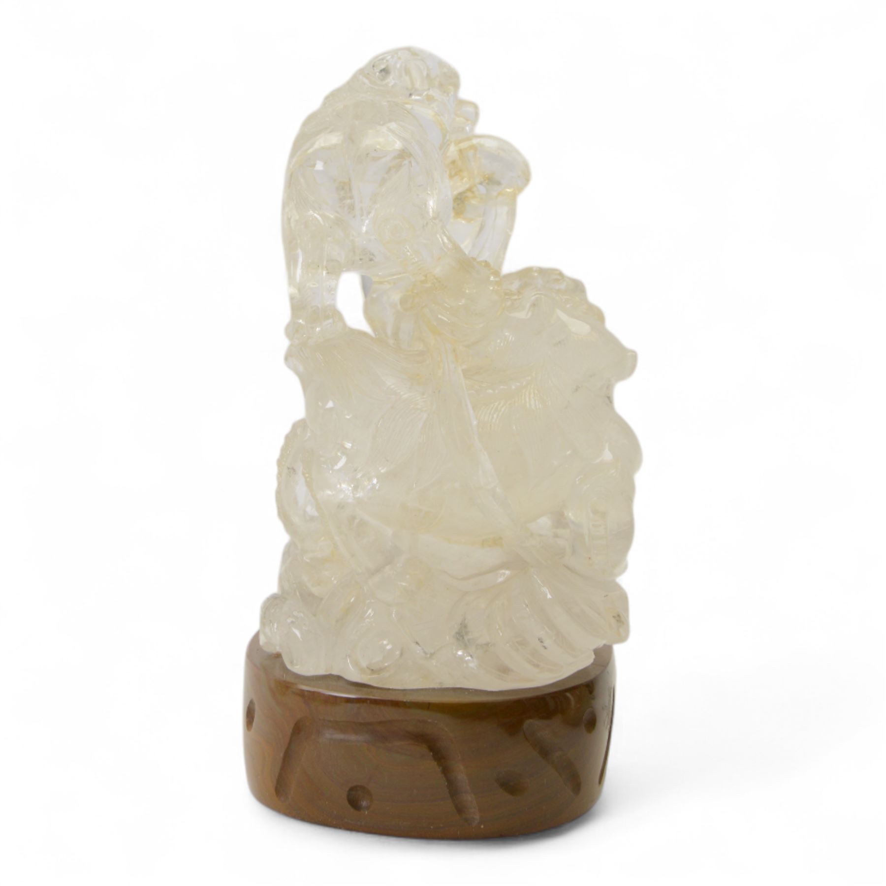 Chinses quartz carved figure group, modelled as three temple lions around a ball, upon an oval base, H20cm