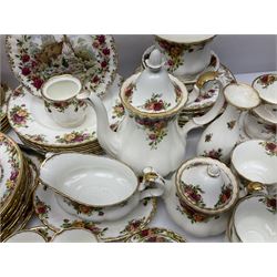 Royal Albert Old Country Roses pattern part tea and dinner service, including coffee pot, miniature teapot and stand, eight dinner plates, cake stand, sauce boat etc 