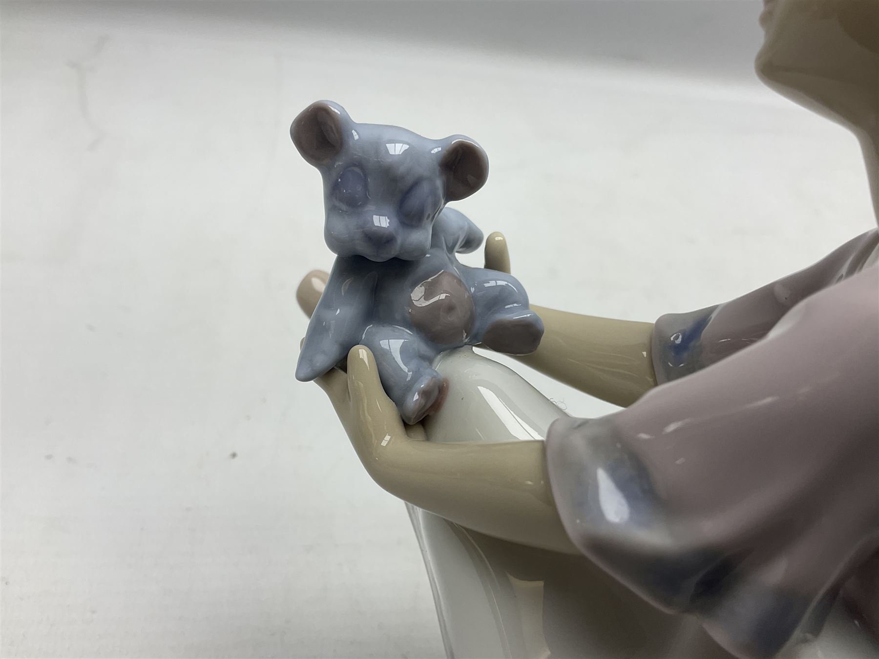 Six Lladro figures, comprising Naughty Dog no 4982, Best Friend 7620 and My Buddy no 7609, Kitty Confrontation no 1442, It Wasn't Me no 7672 and Rabbit Eating no 4772, three with original boxes, largest example H22cm