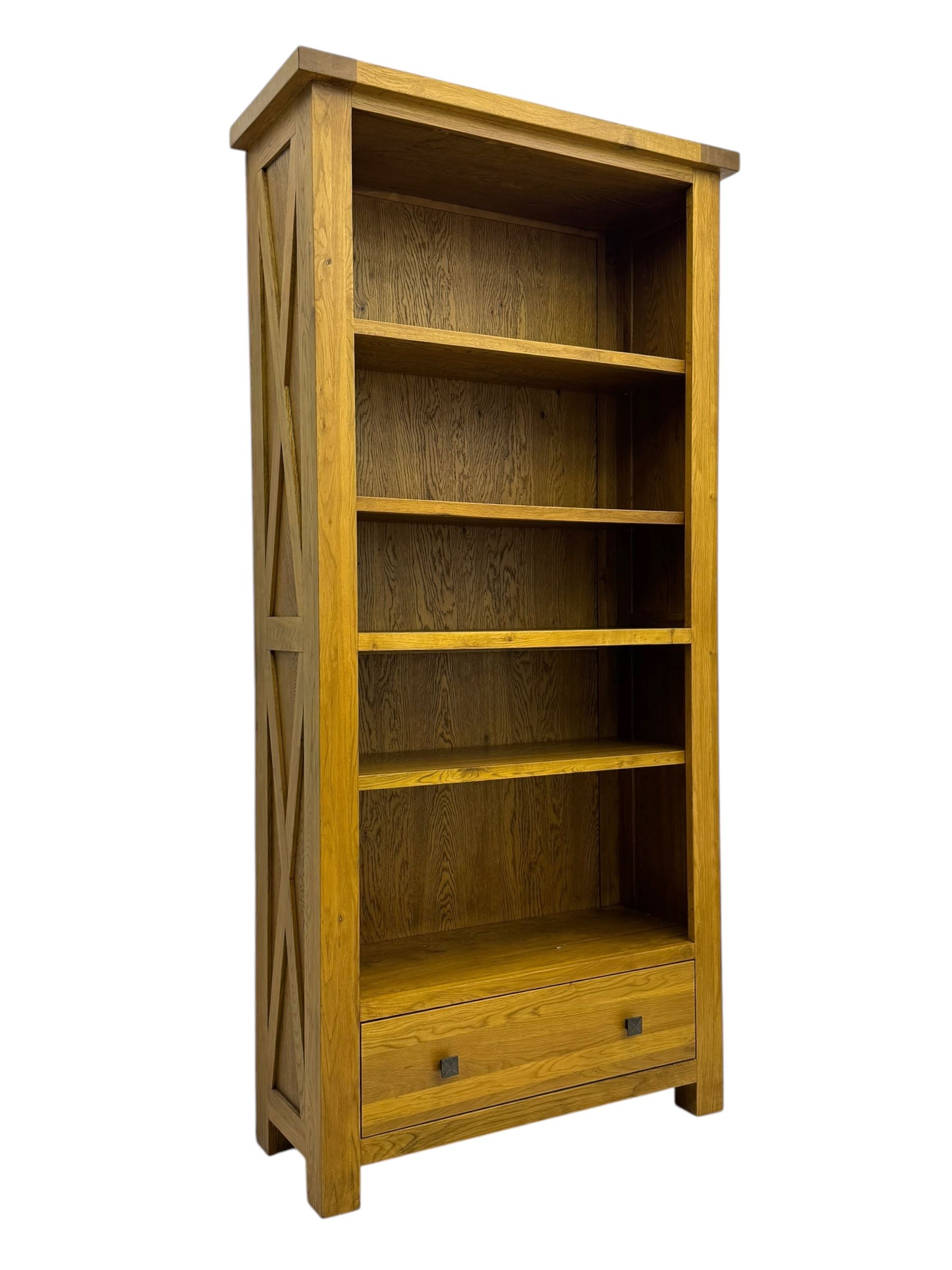 Oak Furnitureland, golden oak open bookcase fitted with single drawer