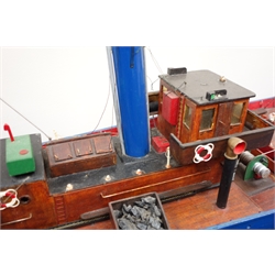  Large wooden scale model of the Steam fishing Trawler 'Joseph & Sarah Miles' LO.175, L120cm, W28cm, H48cm, Built in 1895 the Joseph & Sarah Miles was a Mission Shjp which as part of a Fleet would not fish on a Sunday to enable any Religious crew to attend service. On 12th October 1904 the Gamecock Fleet was fishing Dogger Bank when the Russian Baltic Fleet mistook them for the Japanese Navy and Fired on them. The S.T.Crane was sunk, the injured and survivors were transferred to Joseph & Sarah Miles.   