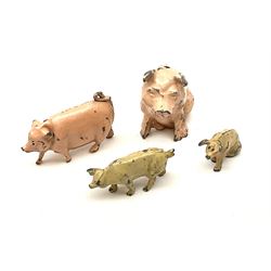 Various Makers - lead figures comprising twelve pigs, eleven sheep/lambs, twenty-four swans/chickens/ducks/geese, thirty-two seated figures, goat, dog, cat, fox etc