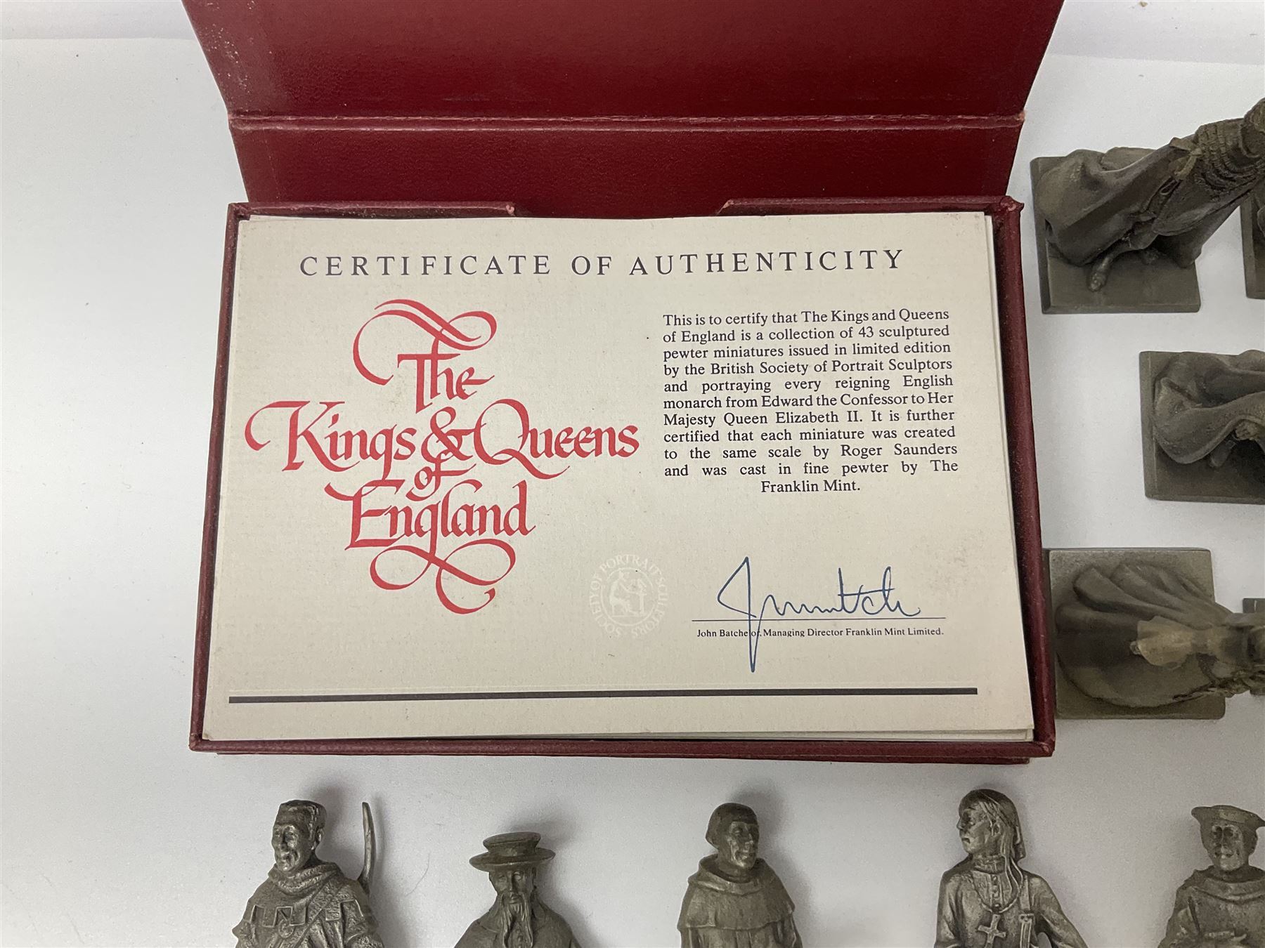 Set of forty three miniature Franklin Mint pewter figures of the Kings and Queens of England, with certificate of authenticity and information cards, together with a collection of twenty four Franklin Mint pewter Charles Dickens character spoons