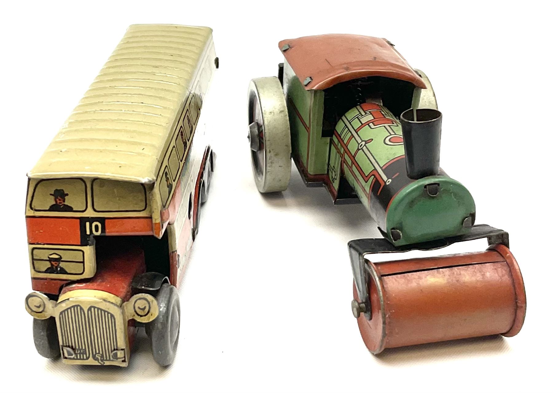 Wells Brimtoy/Pocketoy - eight tin-plate/clockwork or friction-drive vehicles comprising London Trolley Bus, two Double Decker buses, Tour Coach, Greenline Coach, open truck, boxed British railways van and Steam Roller; seven unboxed; and Pocketoy die-cast clockwork saloon car  (9)
