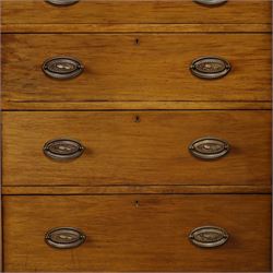 19th century mahogany triple wardrobe, moulded cornice above a central cupboard door enclosing shelves interior, flanked by full height panelled doors with clothes rails in each, the centre fitted with four graduated drawers with oval brass handles, on a moulded plinth base