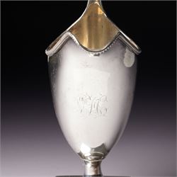 George III silver helmet shape cream jug engraved with a monogram with loop handle on square base H15cm London  1790 Maker Hester Bateman