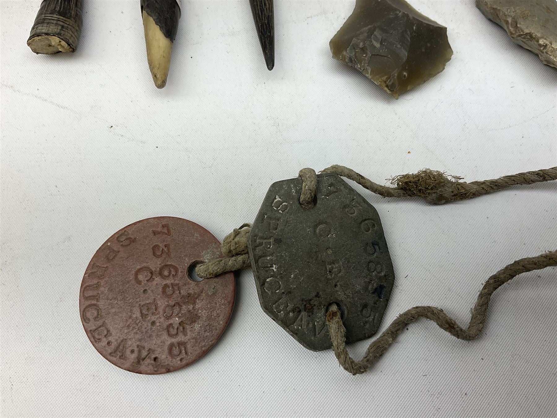 RAF buttons, WWII RAF dog tags, arrowhead flint and other flint and horn 