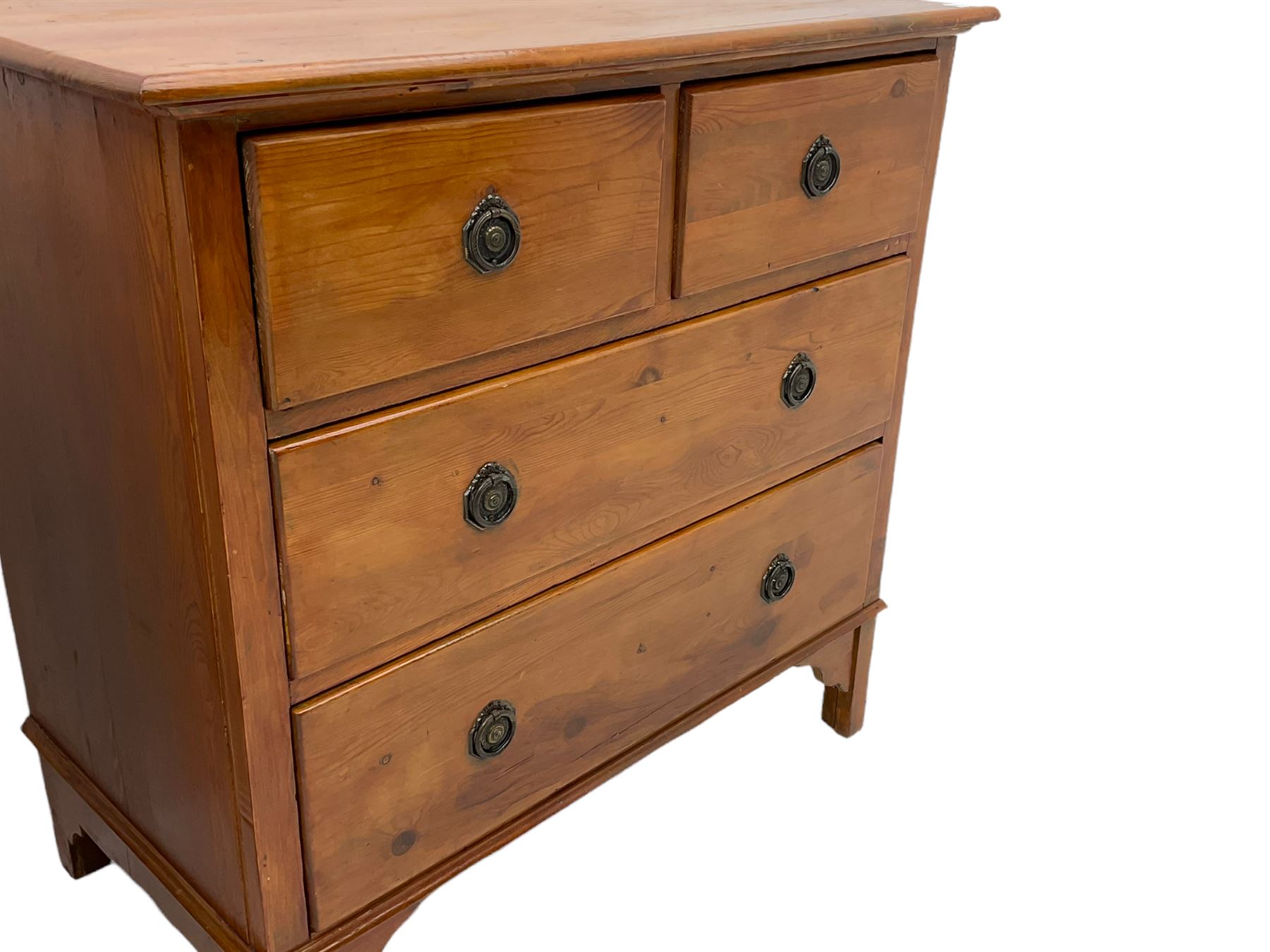 Two stained pine chests of drawers