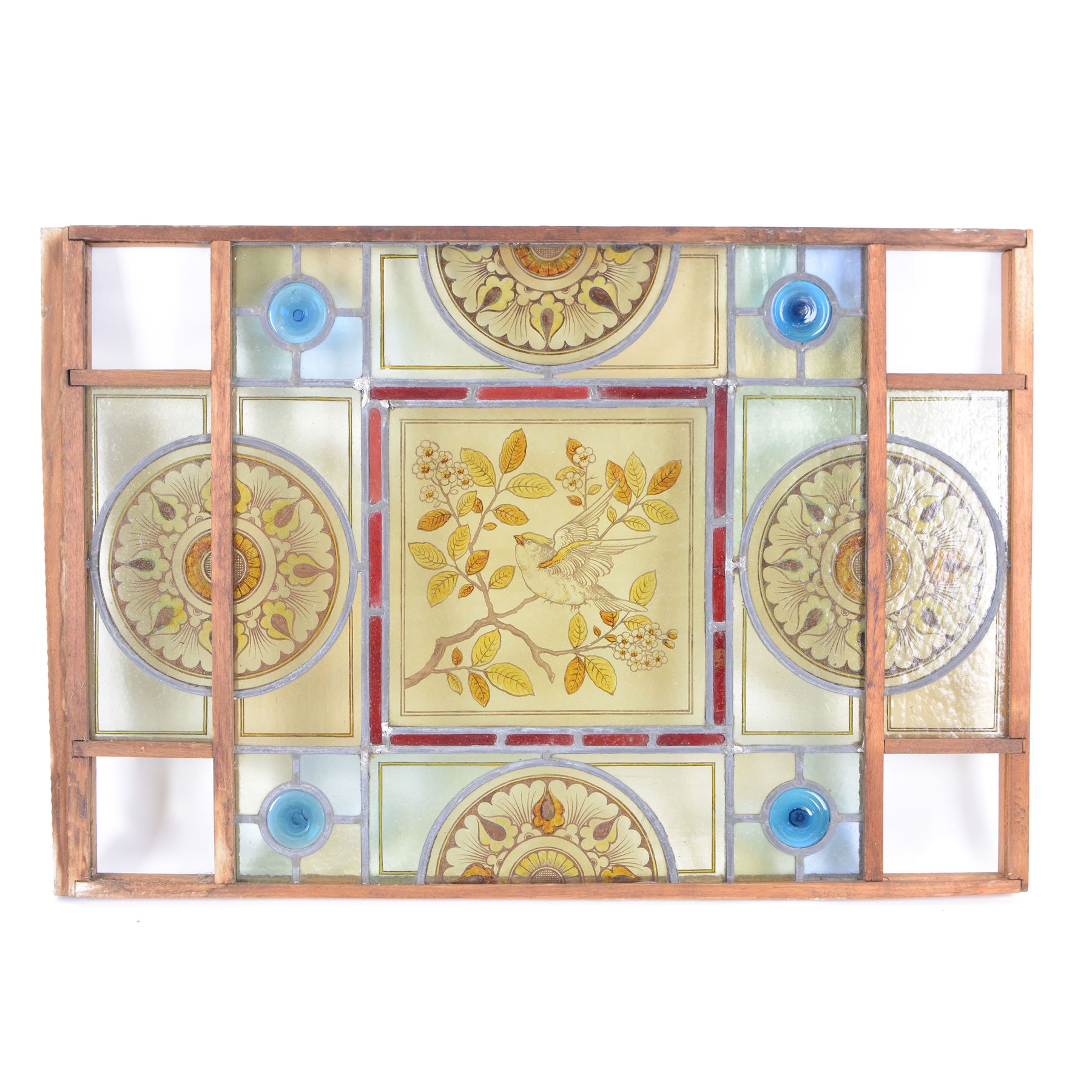 Two stained glass leaded panels each decorated with birds in foliate to to the centre, together with another panel with a female figure to the central panel, largest L78cm, H53cm