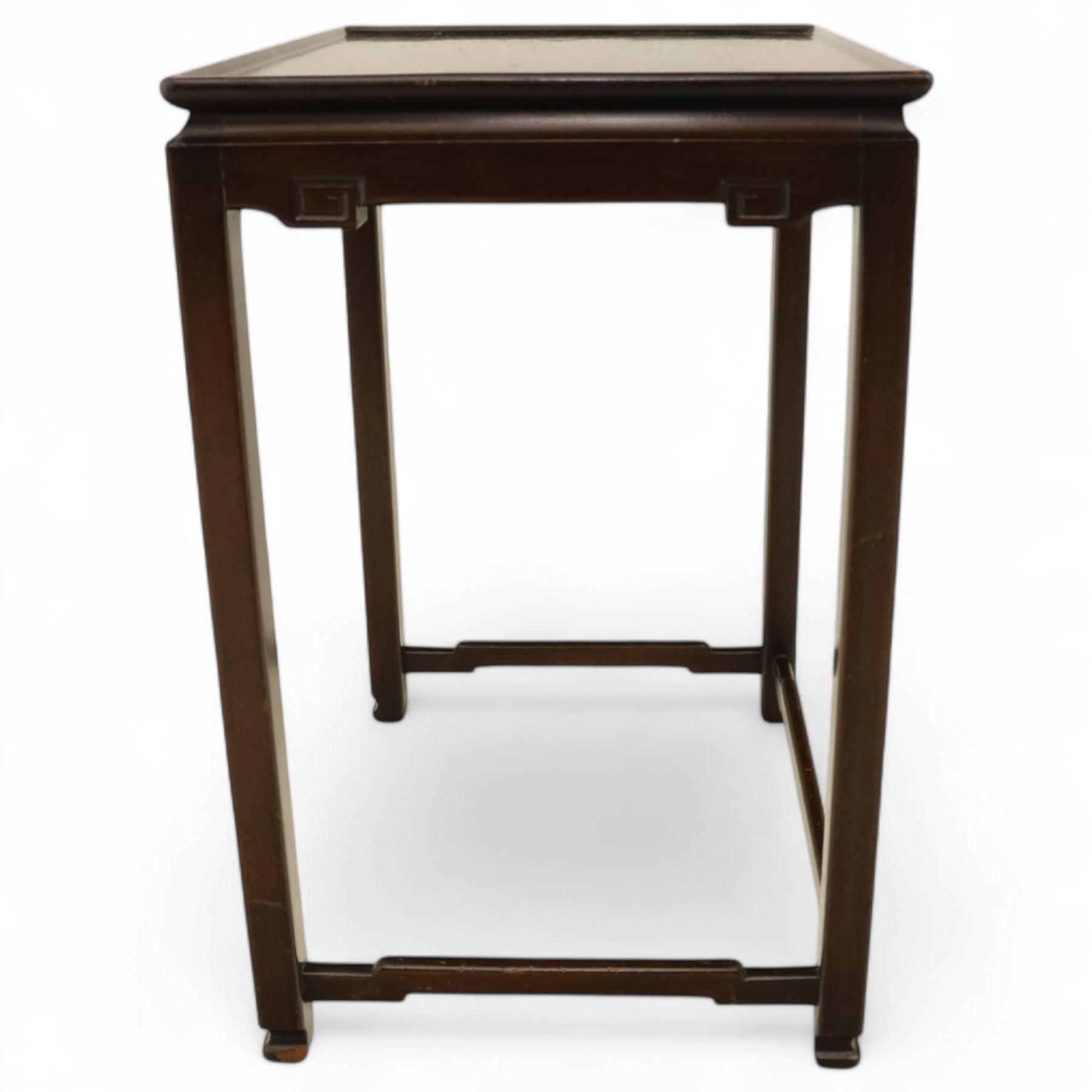 Whytock & Reid, Edinburgh  - Edwardian nest of three Chinese-style solid mahogany occasional tables, rectangular top with finely moulded edge above slim square section legs with subtly chamfered inner edges, joined by H-shaped stretchers, largest W40xD33xH52cm