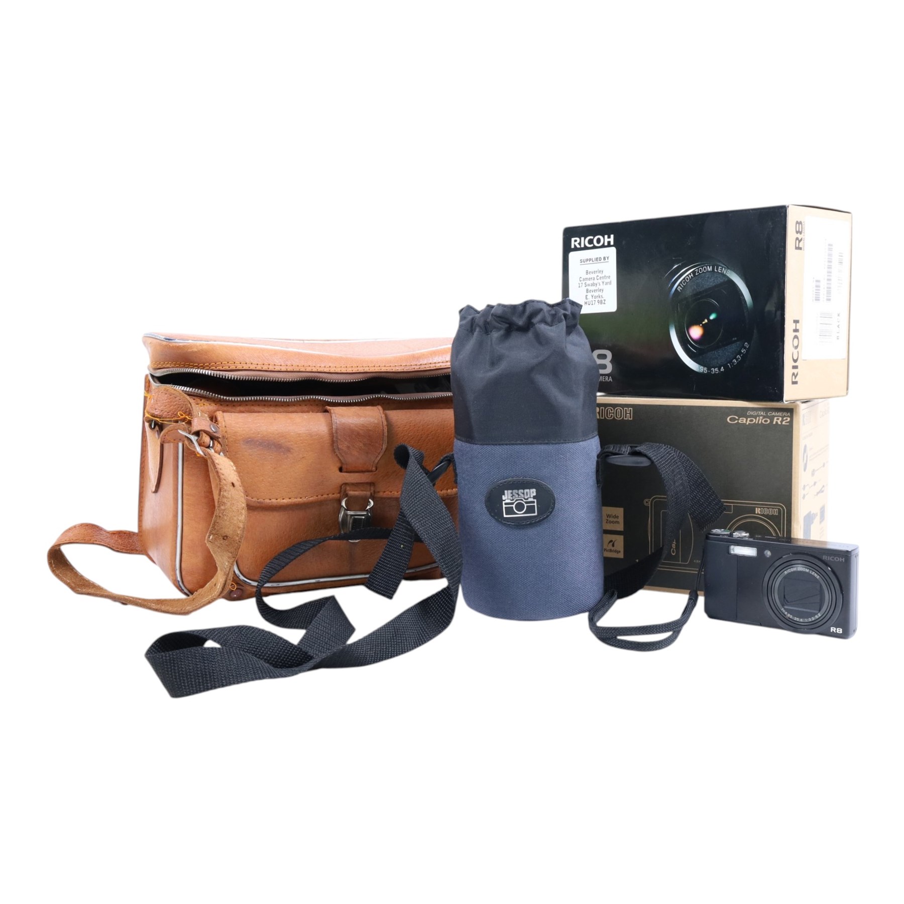 Collection of cameras, including Ricoh Caplio R2, Ricoh R8 digital camera, Tokina SD lens and an Edixa Reflex camera
